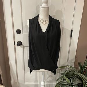 Vince Camuto top, worn once. Not a good fit for my smallish chest